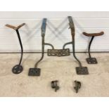A collection of vintage cast metal carriage/buggy steps and reign guides. To include a matching pair