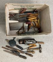 A box of assorted vintage wooden handled tools to include files, chisels, Stanley plane, saws and