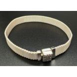 A boxed silver Pandora Reflextions mesh bracelet with clear stone set clasp. Silver and makers marks