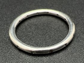 A boxed silver 'Simply Sparkling' band ring by Pandora. Marked inside of band S925 Ale 56. Size