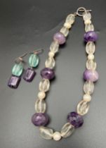 An amethyst, rock Crystal and freshwater pearl necklace with silver T Bar clasp. Together with a