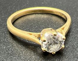 An 18ct gold 0.7ct diamond solitaire ring. Hallmarks and diamond ct to inside of band. Ring size O.