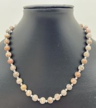A 17" costume jewellery necklace of fossil jasper beads & alternating silver tone beads. Jasper