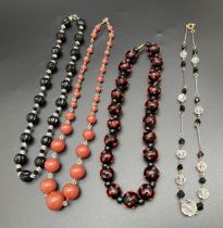 4 vintage glass bead necklaces in varying lengths. To include a 14 inch blue and red art glass