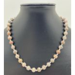 A 17" costume jewellery necklace of fossil jasper beads & alternating silver tone beads. Jasper