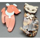 2 Lea Stein style Lucite animal brooches. An orange and pale blue coloured dog together with an