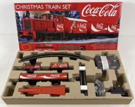A boxed Hornby collectors OO gauge R1233 Coca Cola Christmas Train Set. With original packaging.