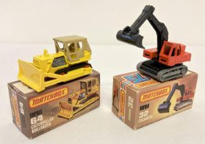 2 boxed Matchbox 75 diecast construction vehicles, #32 Atlas Excavator & #64 Caterpillar