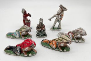 7 vintage painted metal Quiralu Native American, Far West Indian figures.