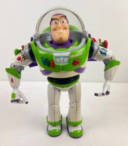 A Disney Store Toy Story Buzz Lightyear figure by Thinkway Toys. Approx. 30cm tall.