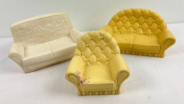 A vintage Sindy doll button backed sofa and matching armchair together with one other vintage