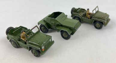 3 Dinky Toys die cast military vehicles. 2 x 674 Austin Champs, both with seated figure, together