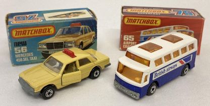 2 boxed Matchbox 75 diecast transport vehicles, #65 Airport Coach & #56 Mercedes 450.SEL Taxi.