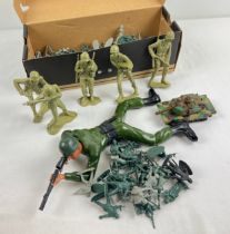 A box of assorted vintage plastic soldiers in varying scales, together with a 1987 Shi Meei Toys