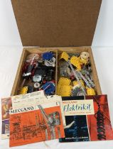 A wooden box containing a small quantity of assorted vintage Meccano & accessories. To include