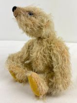 A handmade jointed light blonde long haired mohair teddy by Futch Bears. Approx. 12" long.