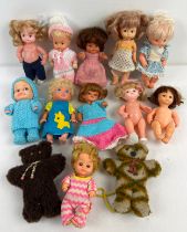 A box of assorted vintage 1960's & 70's Amanda Jane type baby dolls some with knitted clothes and