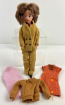 A vintage 1966 Sindy doll with original Foale and Tuffin brown corduroy trouser suit 12S19. Together