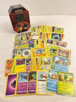 225 assorted Pokemon cards in a 2019 Hidden Fates octagonal shaped tin. Cards comprise 200 character