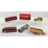 6 vintage Dinky die cast vehicles. A grey and black flatbed tipper truck, red Luxury Coach, Red