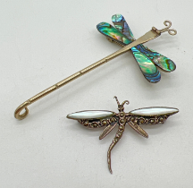 2 silver dragonfly brooches. A Mexican silver brooch with wings set with abalone shell together with