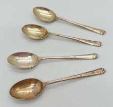 4 vintage silver coffee spoons with Art Deco style design to finial ends. Hallmarked Sheffield 1948.