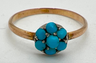 A vintage 9ct rose gold and turquoise dress ring. Small round cabochon of blue turquoise