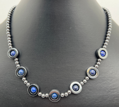 A 16" costume jewellery hematite and lapis lazuli necklace with white metal S shaped clasp.