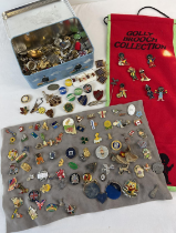 A large collection of pin badges, lapel badges and stick pins. To include Robertson's Golly, Prefect