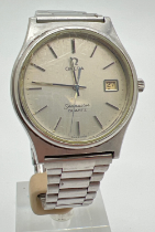 A vintage Omega Seamaster wristwatch with stainless steel strap ref 196 0116. White face with silver