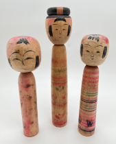 3 vintage wooden hand painted Japanese Kokeshi dolls. With hand painted signature marks to