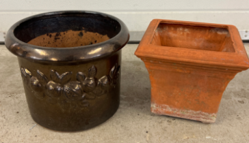 2 modern garden planters. A square shaped terracotta pot together with a lustre glazed circular