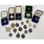 20 vintage boxed and unboxed sports medals and medallions. To include swimming, running, football