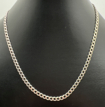 A 17" solid silver flat curb chain necklace with lobster claw clasp. Fully hallmarked to fixing link