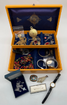 A vintage yellow coloured jewellery box and contents, to include costume jewellery & watches. Lot