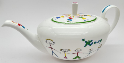 A ceramic Asprey teapot made exclusively for KIDS Charity Gala evening 2003. Designed by Peter