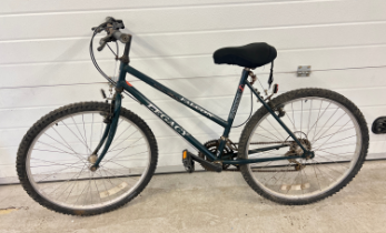 A Shimano Flacon Legacy ladies/girls bike in dark green, with approx. 49cm frame and 26" wheels.