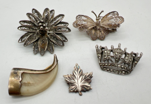 5 vintage silver and white metal vintage brooches to include a filigree butterfly with safety chain,