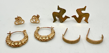 4 pairs of gold and yellow metal stud and hoop style earrings. To include Celtic knots and creole