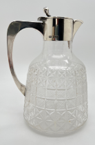 An Edwardian silver & cut glass claret jug by Mappin & Webb, London 1906. Fully hallmarked to neck