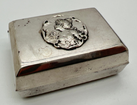 A silver plated Art Nouveau trinket box with ornate 'femme fleur' maiden disc embossed to lid.