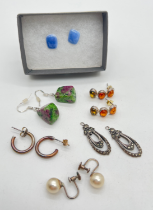 9 pairs of silver and white metal earrings. To include Ruby in Zoisite drops, pale blue ceramic