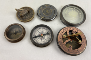 3 metal cased naval compasses. A small brass cased compass with folding sundial screw top lid (