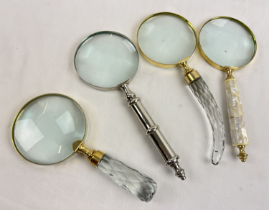 4 large magnifying glasses to include faceted glass handled, brass handled set with pearl, and