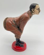 A novelty painted cast metal pin cushion modelled as Adolf Hitler. Approx. 12cm tall.
