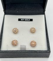 2 pairs of 9ct gold peach coloured disco ball stud earrings. Gold marks to posts. Each earring