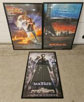 3 framed & glazed movie posters to include Back to the Future, The Matrix and Independence Day.
