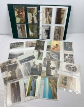 An album of 150+ assorted Edwardian and vintage postcards to include Norfolk scenes, Zoo animals,