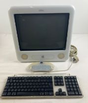 A 2003 Apple eMac all-in-one desktop computer, model A1002. With keyboard, power cable and Ram
