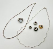 A small collection of silver and white metal jewellery. 2 silver necklaces, one tri coloured,